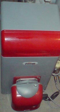 Продам котел отопления на жидком и газообразном топливе FERROLI